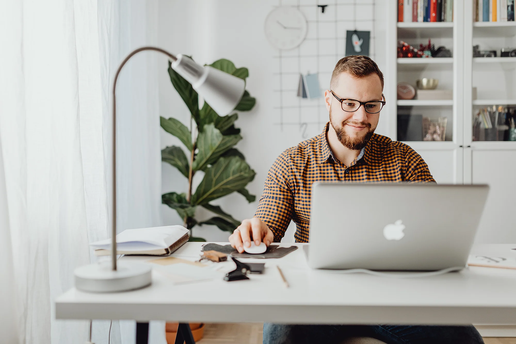 Man studying online in a home office